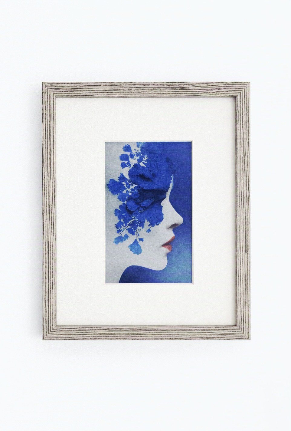 CanvasBT colour e-ink art frame displaying artwork on a wall