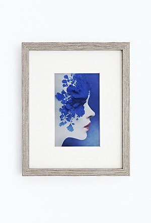 CanvasBT colour e-ink art frame on a wall